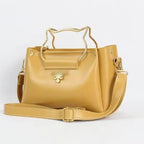 Cat handle cross body bag